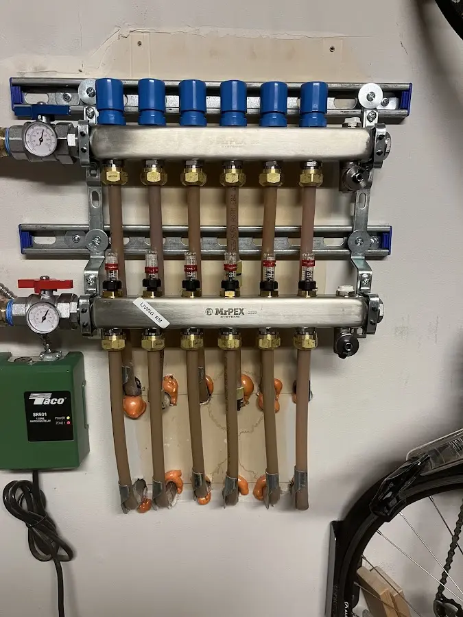 Plumber performing Water Heater Repair at a residential property in Morristown